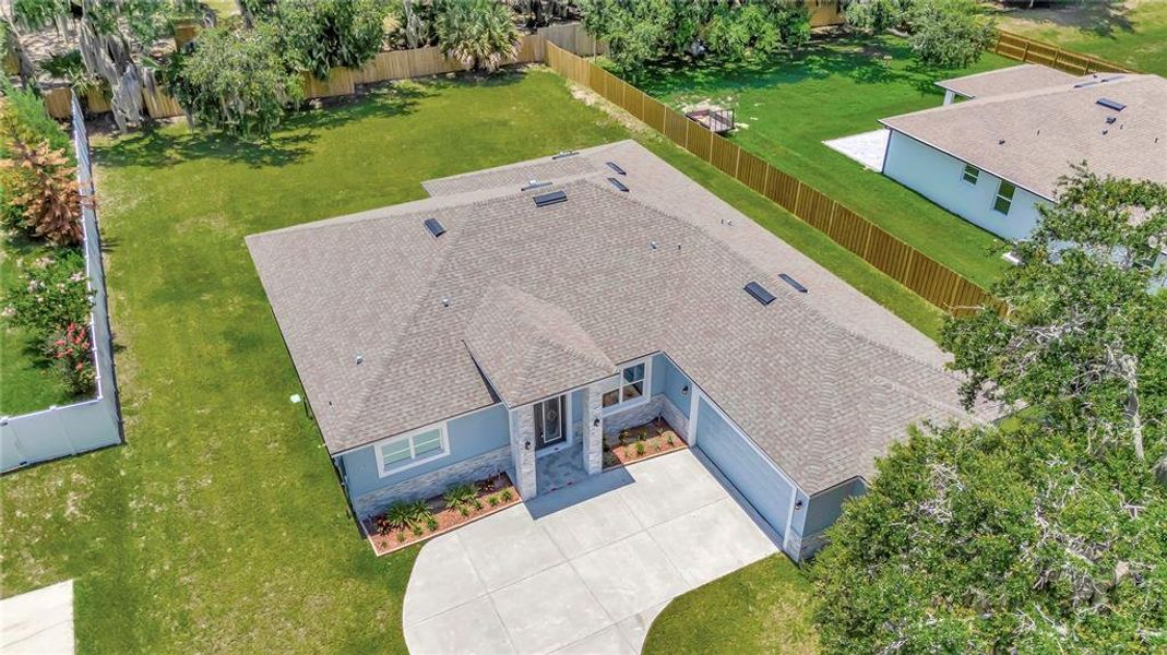 Front exterior of a new home in , Leesburg, FL, highlighting curb appeal (Image 23).