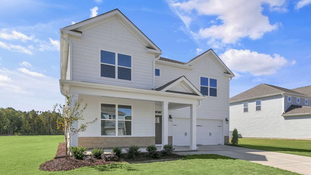 Representative exterior photo of a completed home built from the LAWSON by D.R. Horton in Eagle Creek, Fuquay Varina, NC (Image 15).