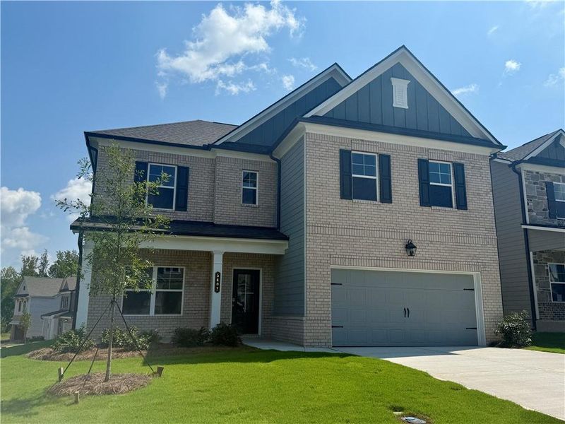 Front exterior of a new home in Ponderosa Farms Estates, Gainesville, GA, highlighting curb appeal (Image 45).