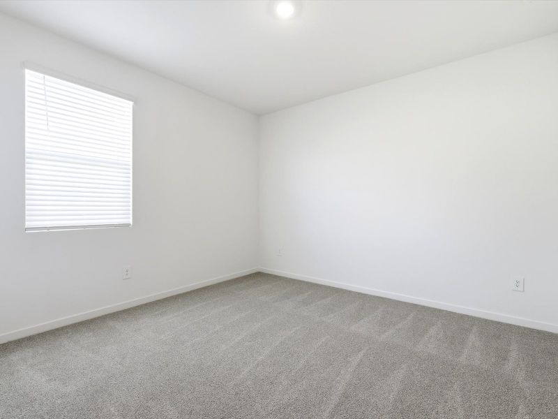Spacious, unfurnished interior of a new home in Mountain View Estates Signature Series, Buckeye (Image 11).