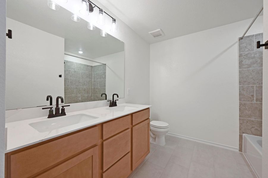 Furnished interior view inside a new home in Creekside at Estancia, Austin (Image 9).