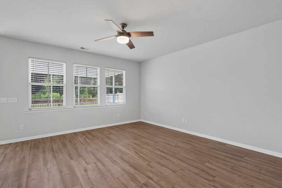 Spacious, unfurnished interior of a new home in Sweetgrass at Summers Corner, Summerville (Image 51).