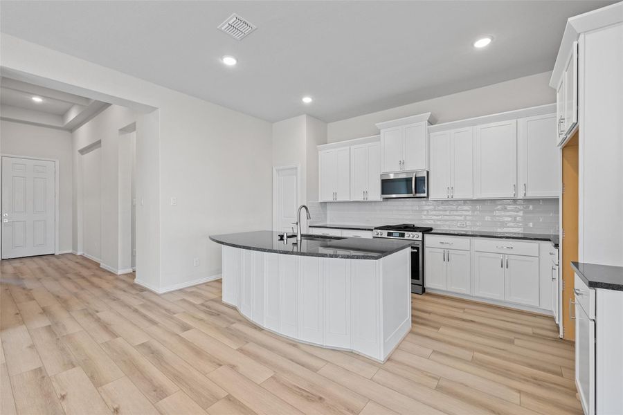 Furnished interior view inside a new home in Coastal Point, League City (Image 13). Furnished interior view inside a new home in Coastal Point, League City (Image 13).