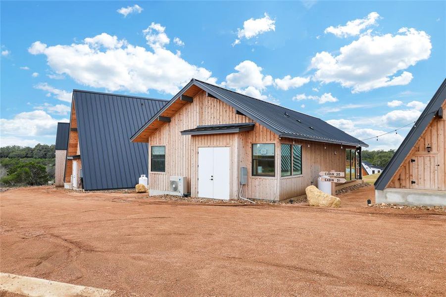 This open area allows for flexible parking arrangements and adds to the home's spacious feel.