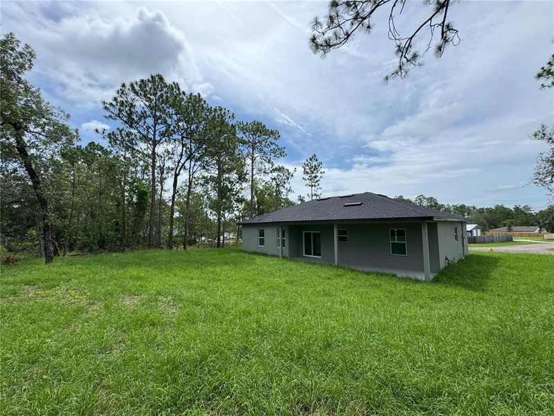 Front exterior of a new home in , Citrus Springs, FL, highlighting curb appeal (Image 25).