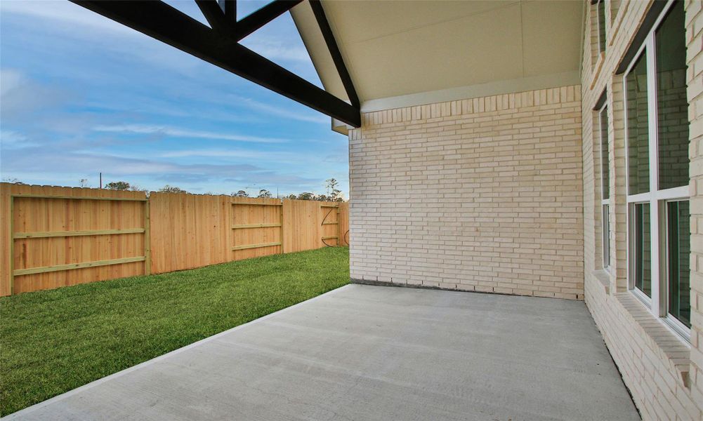Exterior details and patio area of a home in Sundance Cove, Crosby (Image 3). Exterior details and patio area of a home in Sundance Cove, Crosby (Image 3).
