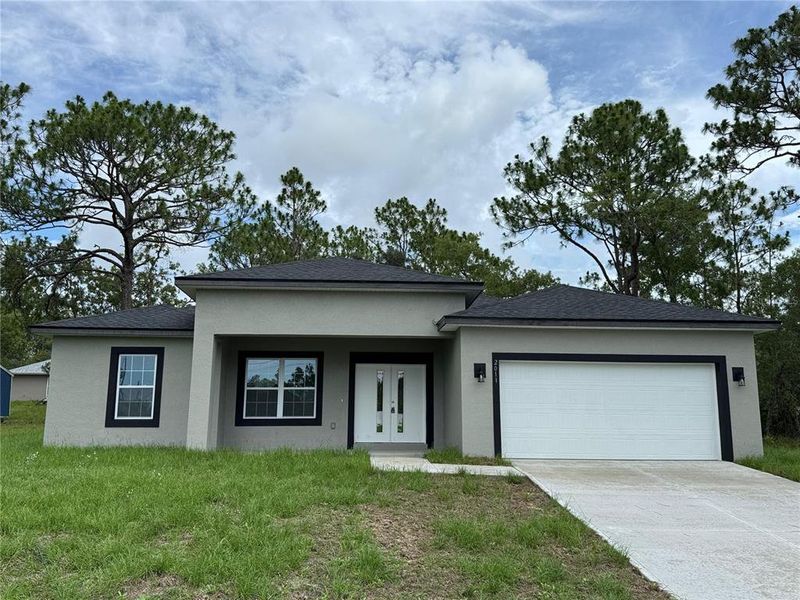 Exterior details and patio area of a home in , Citrus Springs (Image 31).