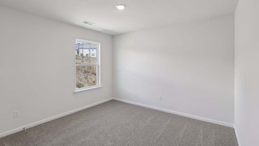 Spacious, unfurnished interior of a new home in Rydele Heights, Asheville (Image 39).