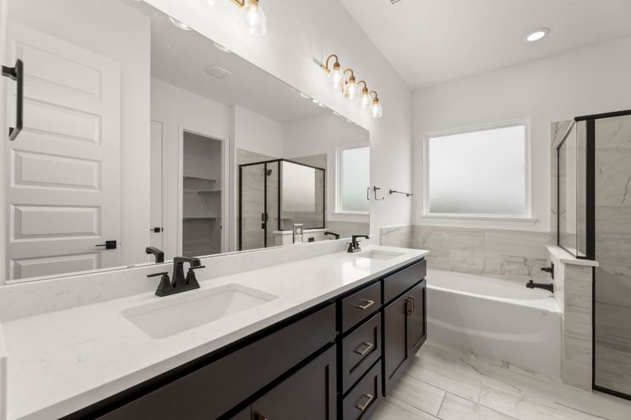 Representative furnished interior of a home built from the The Whitney by UnionMain Homes in Cambridge Crossing, Celina (Image 12).