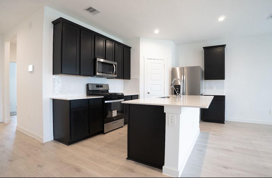 Furnished interior view inside a new home in Tamarron, Katy (Image 8).