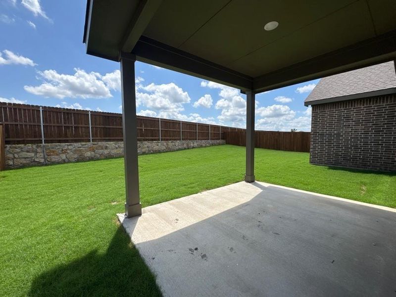 Exterior details and patio area of a home in Cedar Ridge Estates, Anna (Image 3).