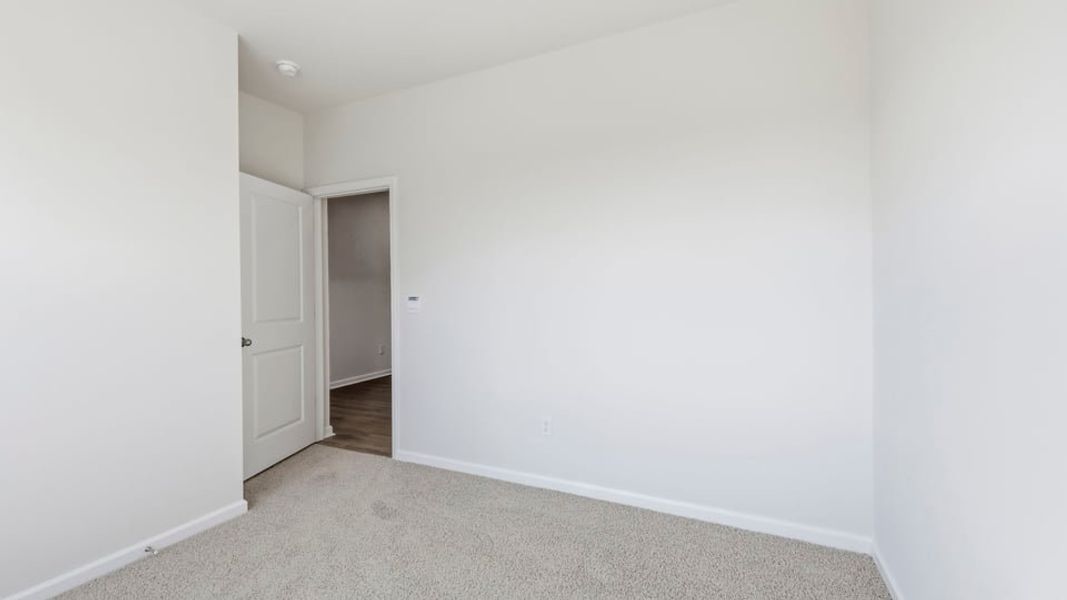 Spacious, unfurnished interior of a new home in Benjamin's Grove, Woodruff (Image 21).