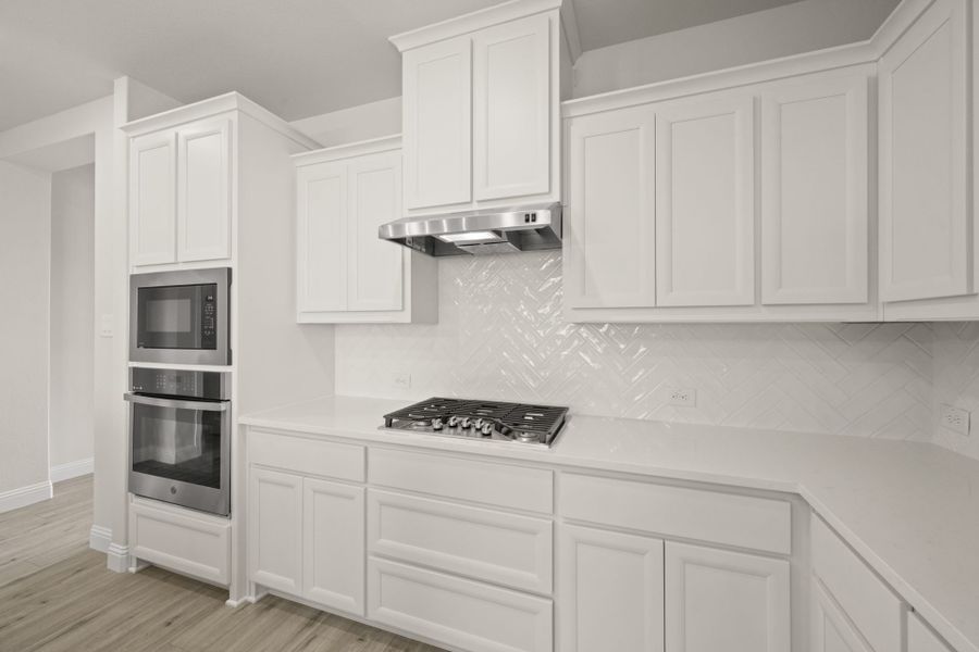 Furnished interior view inside a new home in Creekview Meadows, Pilot Point (Image 6).