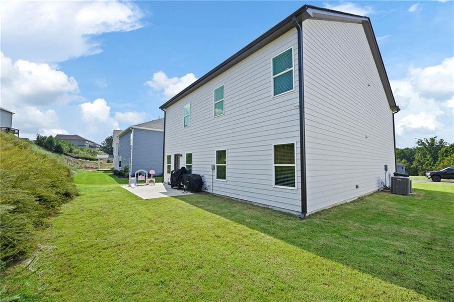 Front exterior of a new home in , Dallas, GA, highlighting curb appeal (Image 2).