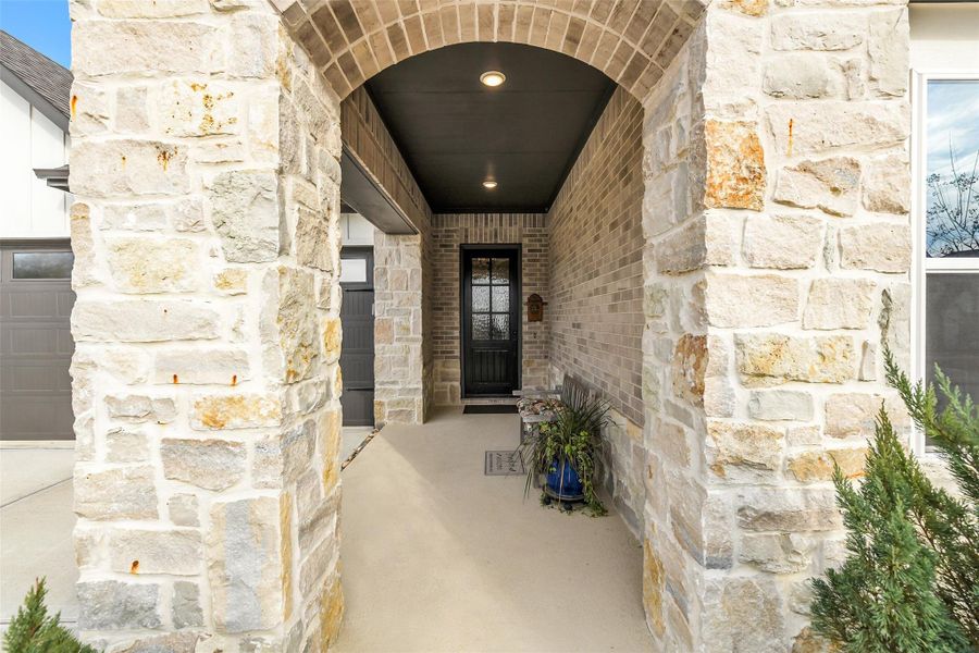 Exterior details and patio area of a home in Chambers Creek, Willis (Image 3).