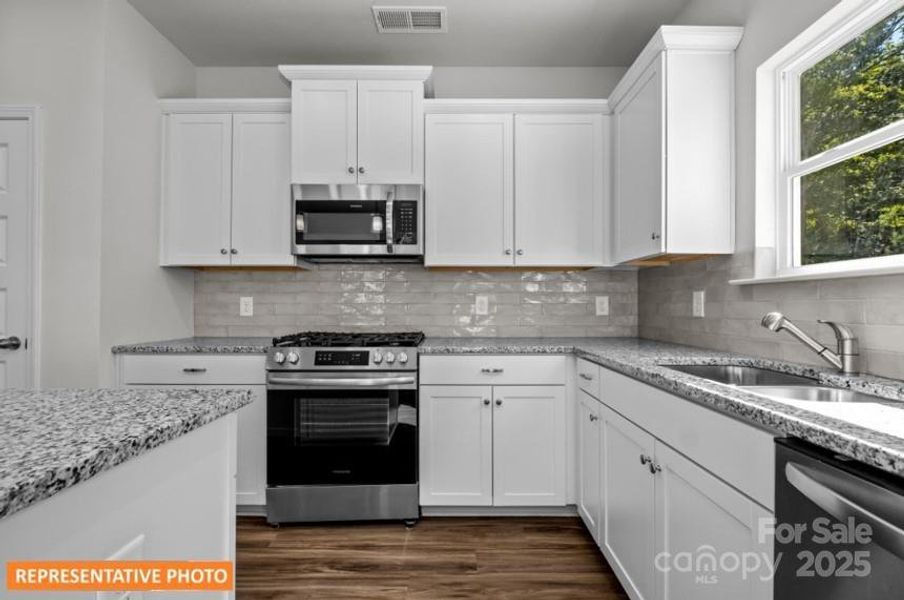 Furnished interior view inside a new home in Green Acres, Concord (Image 5).