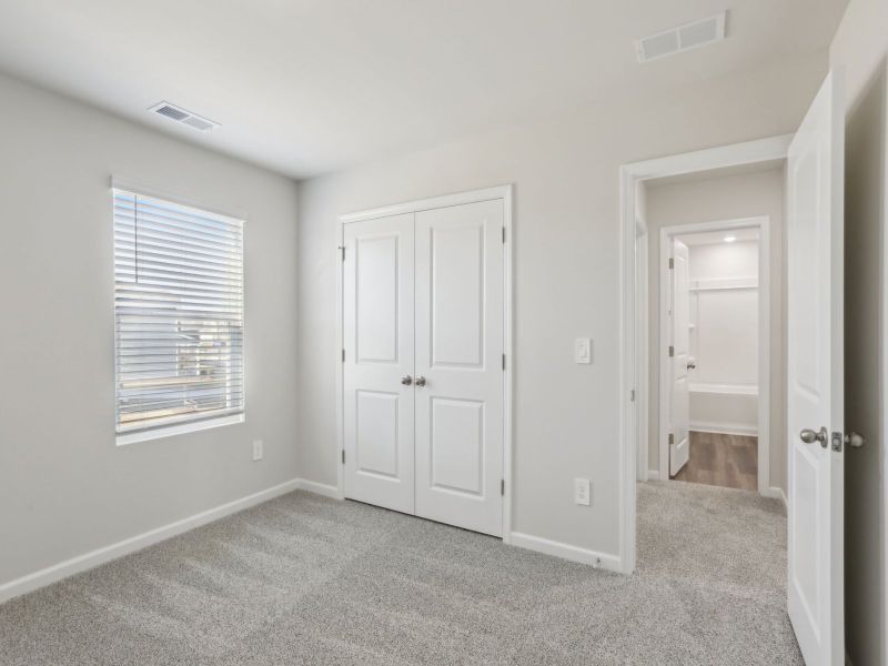 Secondary bedroom in the Dakota floorplan at 199 White Birch Lane.