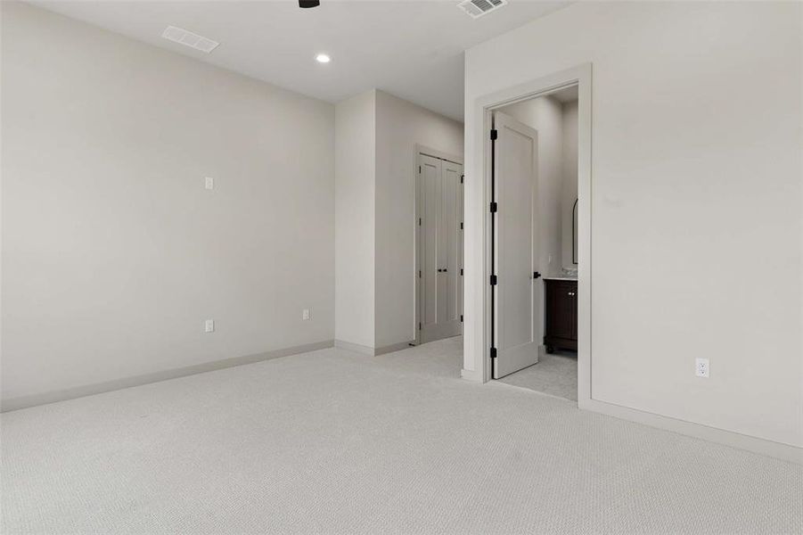 Second level bedroom with ensuite bathroom. Second level bedroom with ensuite bathroom.