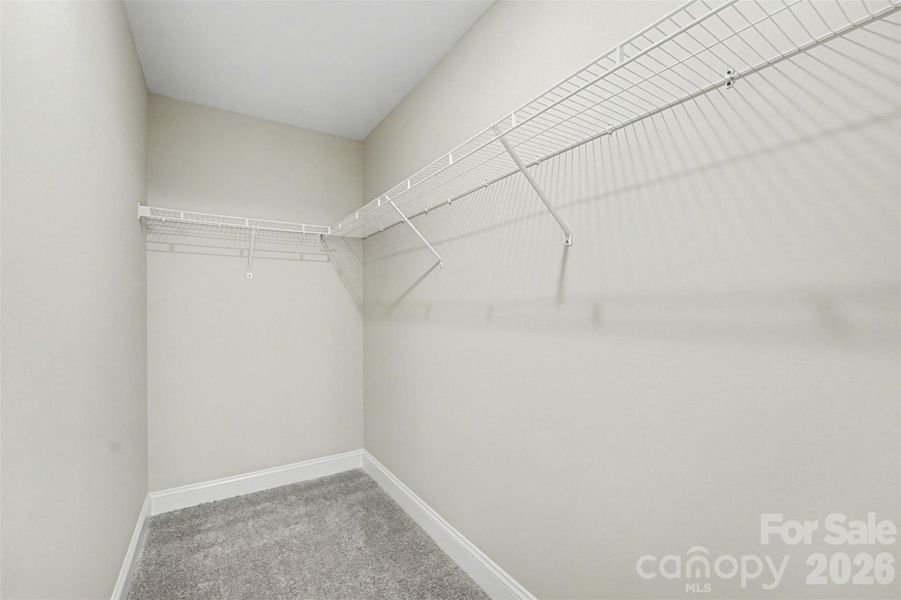 Primary Walk in Closet Primary Walk in Closet