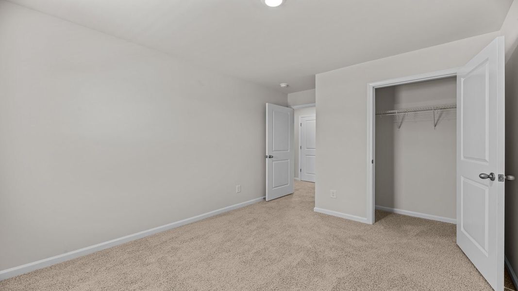 Representative unfurnished interior of a home built from the PEARSON II by D.R. Horton in Clock Road Townhomes, New Bern (Image 34). Representative unfurnished interior of a home built from the PEARSON II by D.R. Horton in Clock Road Townhomes, New Bern (Image 34).