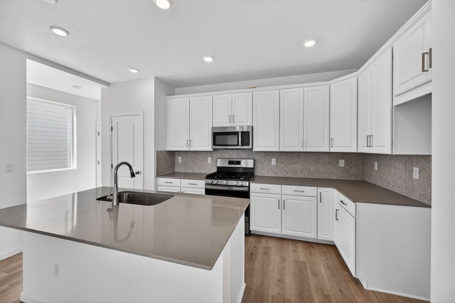 Furnished interior view inside a new home in Sky Ranch, Watkins (Image 3).