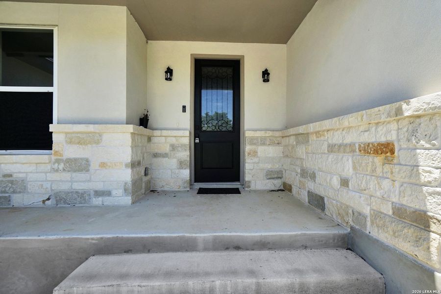 Exterior details and patio area of a home in , Fischer (Image 23).