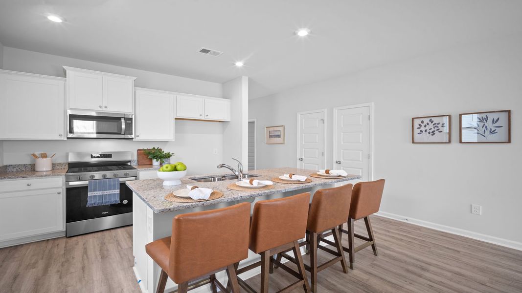 Furnished interior view inside a new home in The Lakes at North Glynn, Brunswick (Image 6).