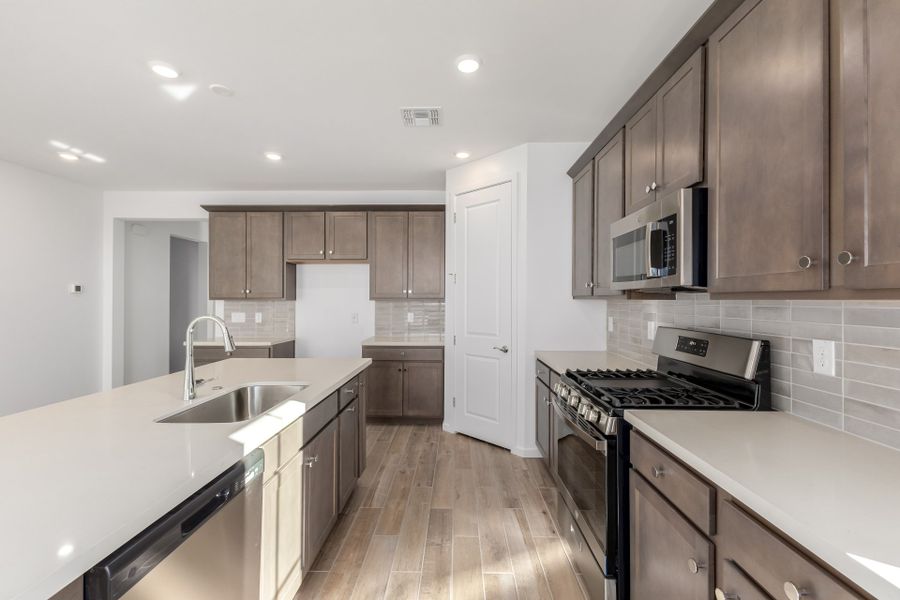 Furnished interior view inside a new home in Teravalis, Buckeye (Image 7).