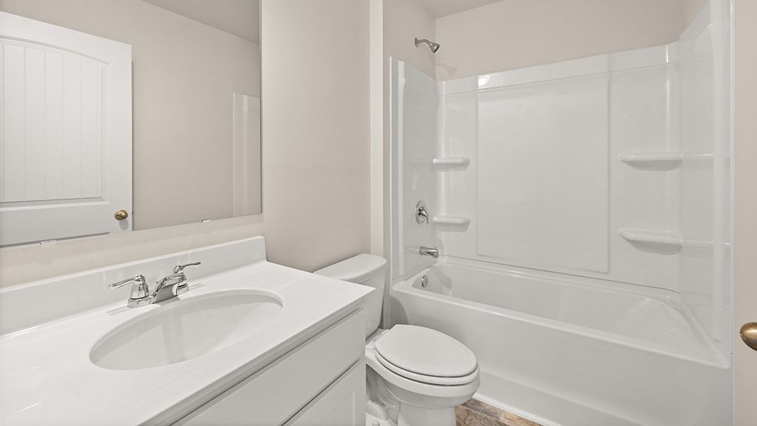 Representative furnished interior of a home built from the Mansfield by D.R. Horton in Northwoods at Mirror Lake, Villa Rica (Image 16).