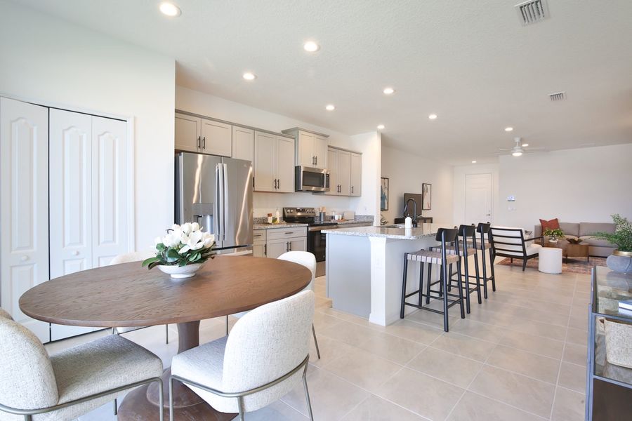 Representative furnished interior of a home built from the Morgan by Neal Communities in SkySail, Naples (Image 23).
