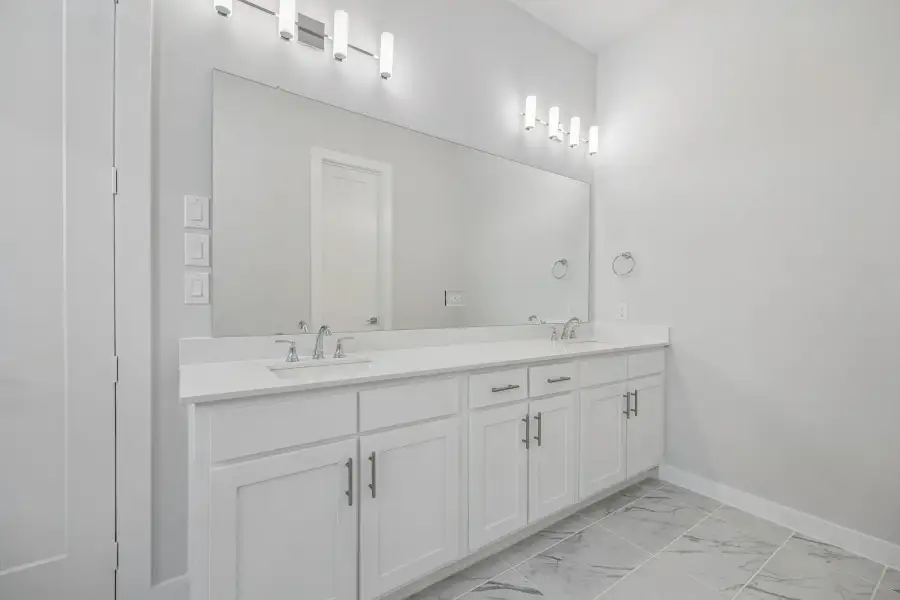Bathroom in the Monet II home plan by Trophy Signature Homes – REPRESENTATIVE PHOTO Bathroom in the Monet II home plan by Trophy Signature Homes – REPRESENTATIVE PHOTO