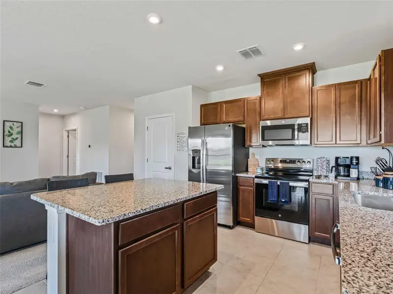 Furnished interior view inside a new home in , Sumterville (Image 37).