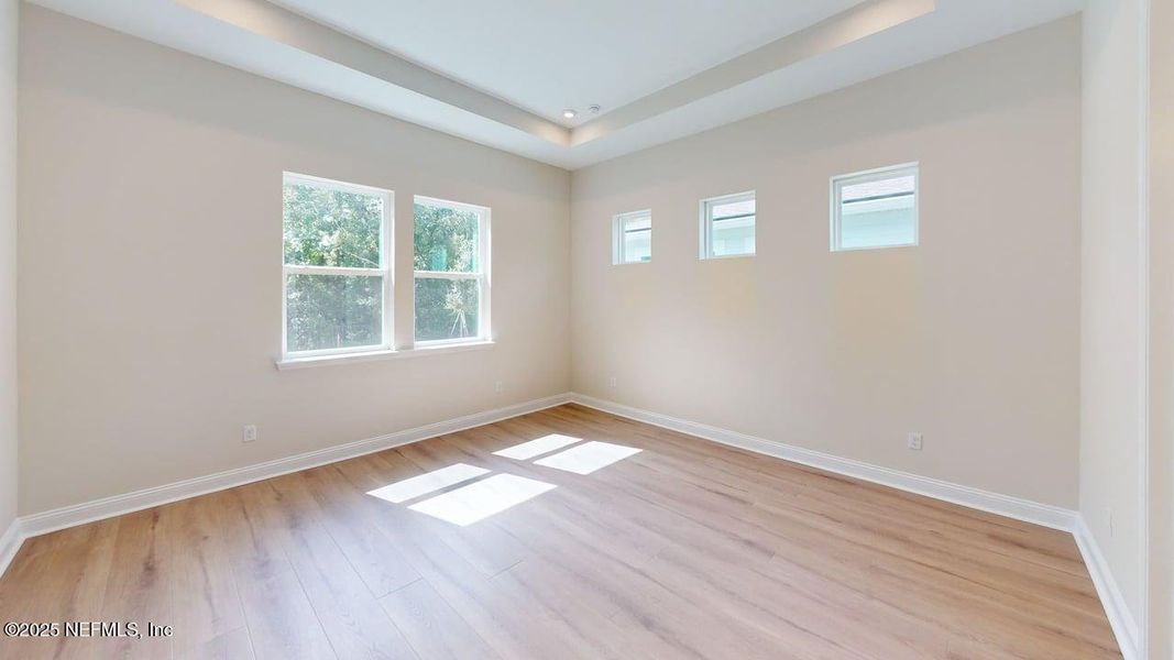 Spacious, unfurnished interior of a new home in RiverTown - WaterSong, St. Johns (Image 12).