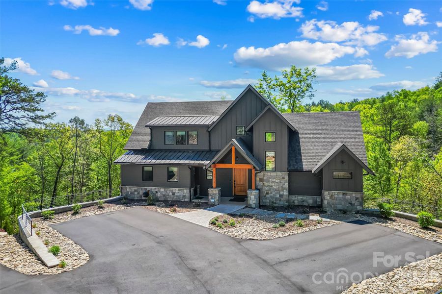 Front exterior of a new home in , Marion, NC, highlighting curb appeal (Image 25).