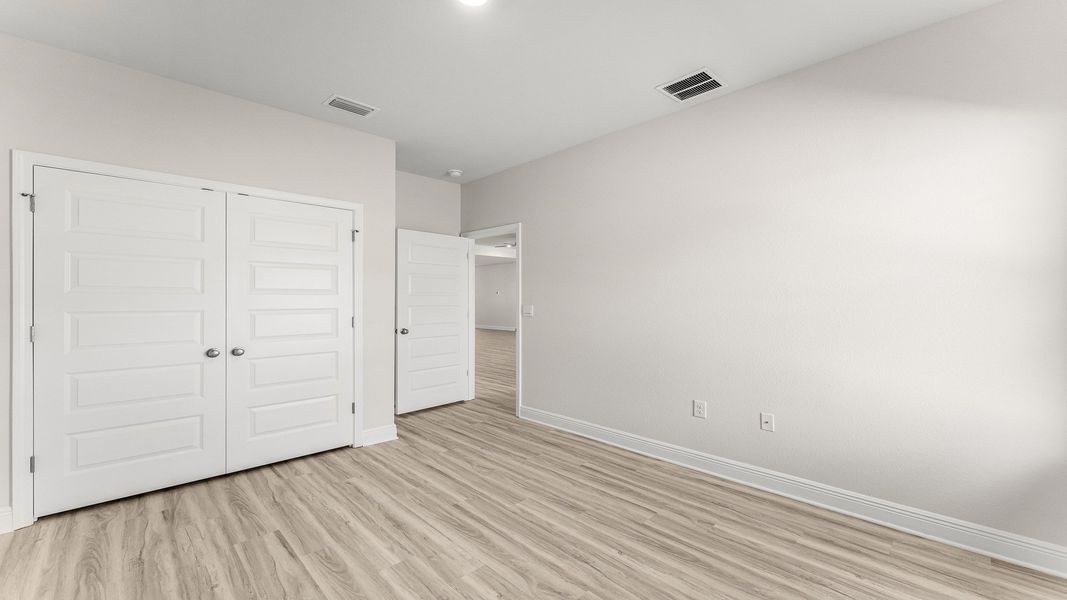Representative unfurnished interior of a home built from the The Destin by D.R. Horton in Pine Creek and Heron Walk, Port St. Joe (Image 34).