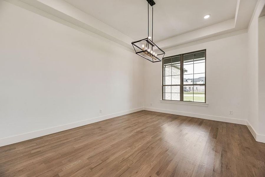 Spacious, unfurnished interior of a new home in King's Crossing - Phase 3, Parker (Image 27).