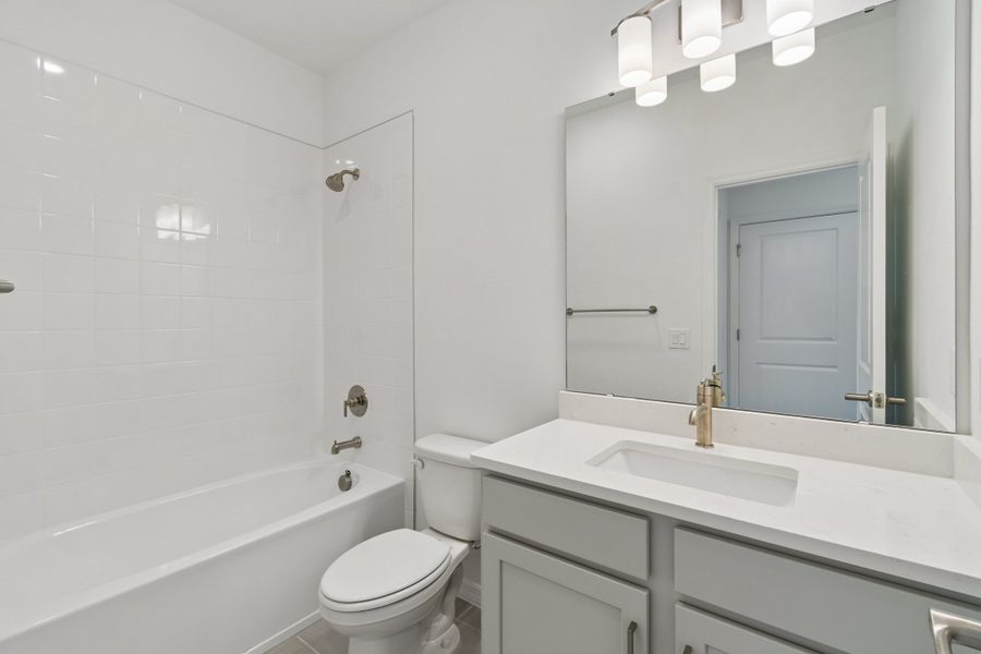 Furnished interior view inside a new home in Baldwin Crossing 16', Orlando (Image 5).