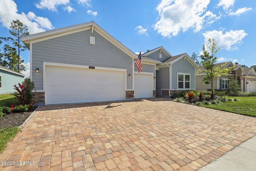 Exterior details and patio area of a home in Longleaf: Longleaf 60s, Jacksonville (Image 26).