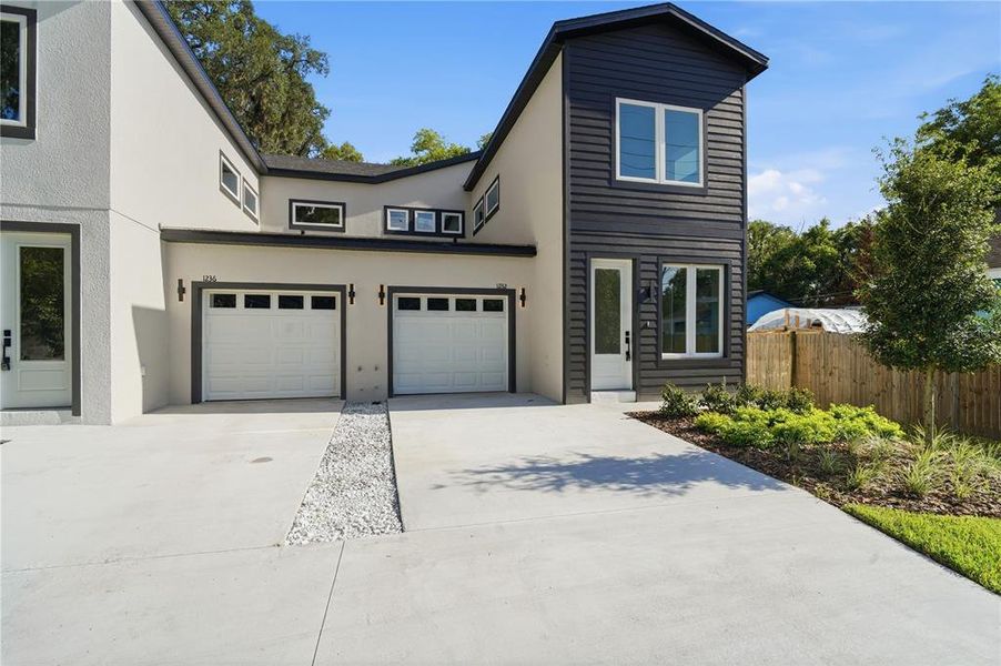 Front exterior of a new home in , Orlando, FL, highlighting curb appeal (Image 21). Front exterior of a new home in , Orlando, FL, highlighting curb appeal (Image 21).