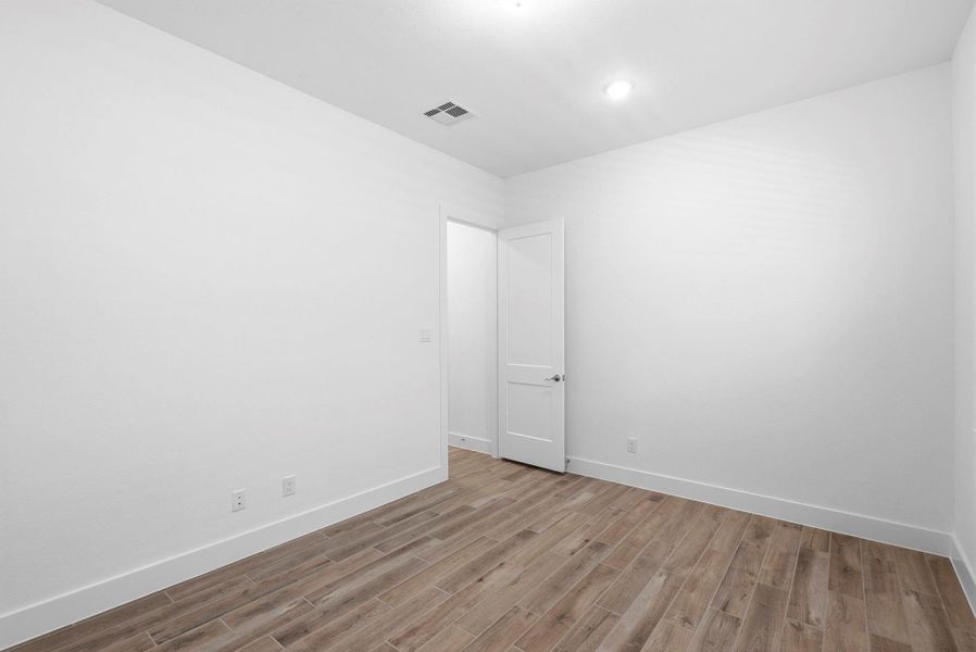 Spacious, unfurnished interior of a new home in Meridiana, Manvel (Image 17).