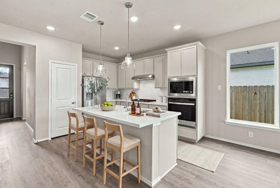 Furnished interior view inside a new home in The Trails, New Caney (Image 9).