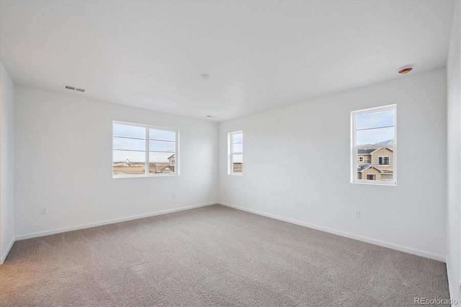 Spacious, unfurnished interior of a new home in Fossil Creek, Windsor (Image 16).