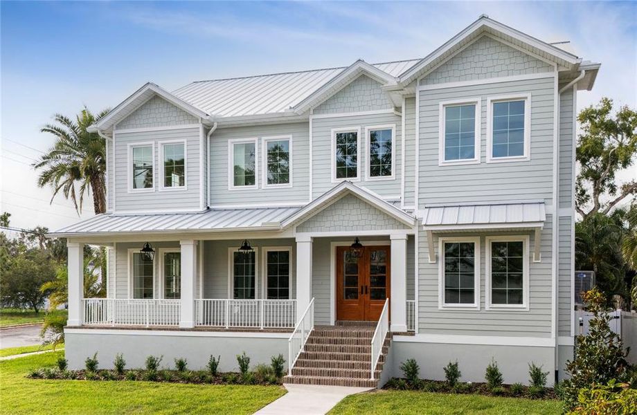 Front exterior of a new home in , Tampa, FL, highlighting curb appeal (Image 1). Front exterior of a new home in , Tampa, FL, highlighting curb appeal (Image 1).