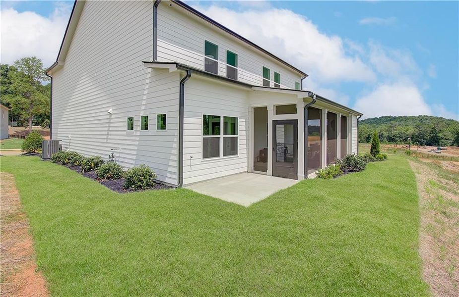 Exterior details and patio area of a home in Rosewood Lake Estates, Hoschton (Image 30).