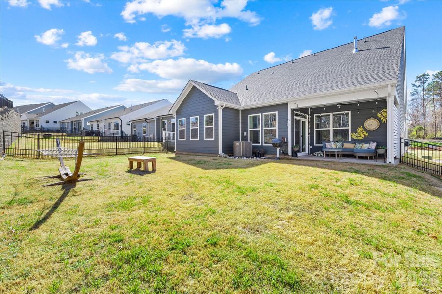 Exterior details and patio area of a home in Villas at Prestwick, Mooresville (Image 22).