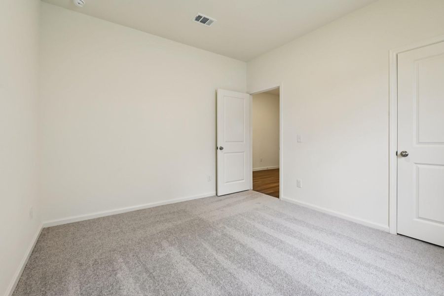 Spacious, unfurnished interior of a new home in Williams Landing, Waller (Image 18).