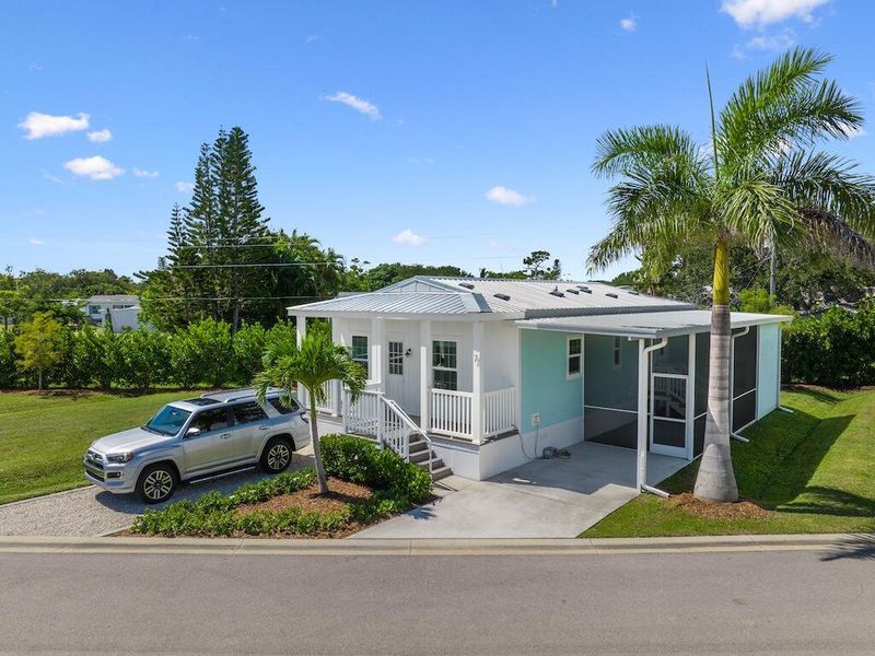 Front exterior of a new home in , Sebastian, FL, highlighting curb appeal (Image 20).
