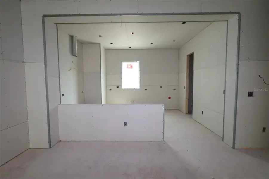 In-progress construction of a new home in Towns at Union, St. Petersburg, FL (Image 13).