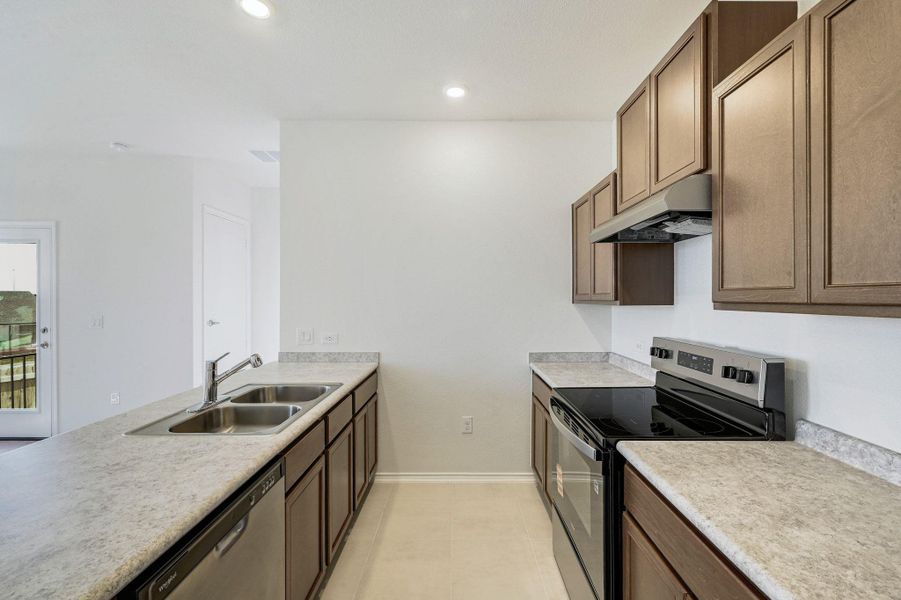 Furnished interior view inside a new home in Creekside at Estancia, Austin (Image 6).