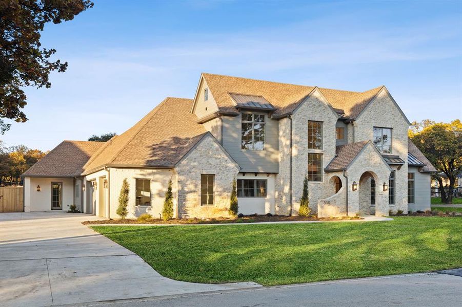 Front exterior of a new home in , Colleyville, TX, highlighting curb appeal (Image 20).